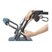 Close-up of hands adjusting the braking mechanism on a Medline Steel Rollators with Microban. The image highlights the handlebar and brake system, designed for exceptional mobility support, with fingers pointing at the adjustment area.