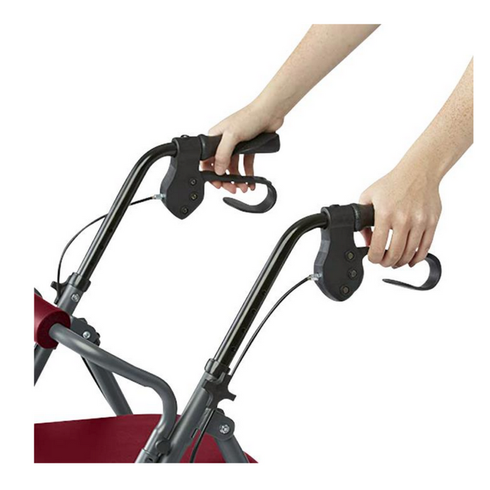 Hands adjusting the handles of a red Medline Steel Rollator with Microban, featuring brakes and curved grips. The metallic frame is partially visible, showcasing the antimicrobial handlebar mechanism for improved safety and hygiene.