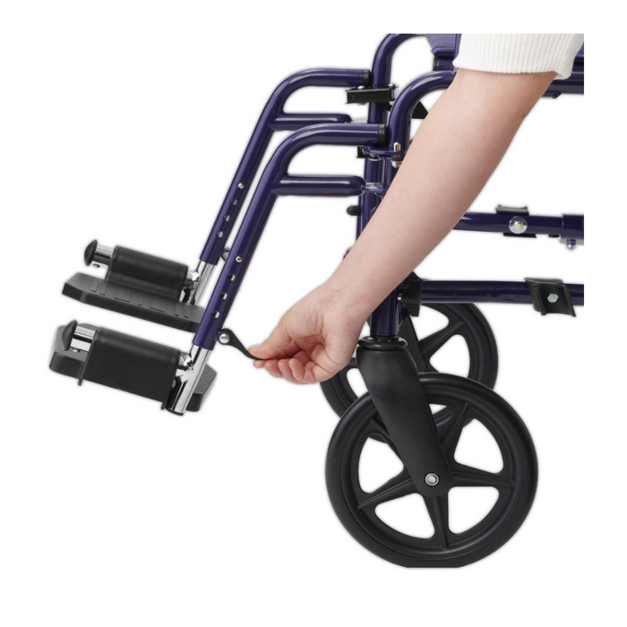 A person’s hand adjusts a lever near the front wheel of the Medline Basic Steel Transport Chair, demonstrating how to assemble or fold the wheelchair with 12 rear wheels.