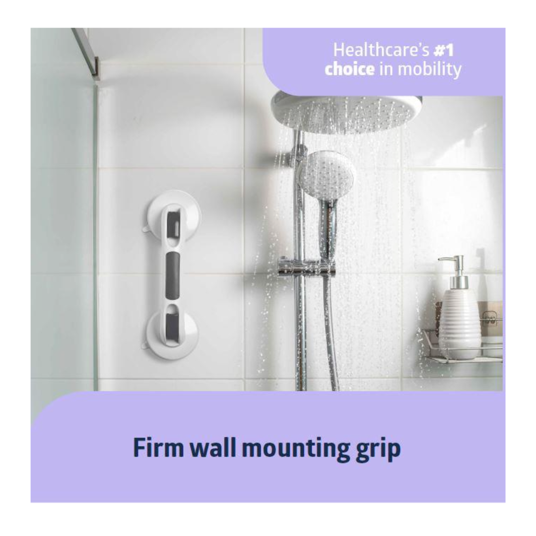 A Medline Bathe Safe & Easy Kit for Caregivers with Shower Chair is installed in a tiled shower with a grab bar, handheld showerhead, and bath essentials. Water sprays from the showerhead. Text: Healthcares #1 choice for bath safety and mobility.