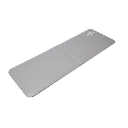 A grey rectangular Medline Bi-Fold Beveled Edge Fall Mat with rounded corners, a visible fold crease, and a white logo in the upper right corner.