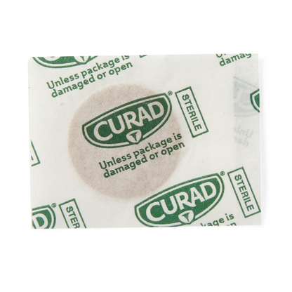 Medline CURAD Flex-Fabric Adhesive Spot Bandages are round, flexible bandages in white packaging with green Curad logos, labeled "STERILE unless damaged or open." Ideal for protecting minor wounds.