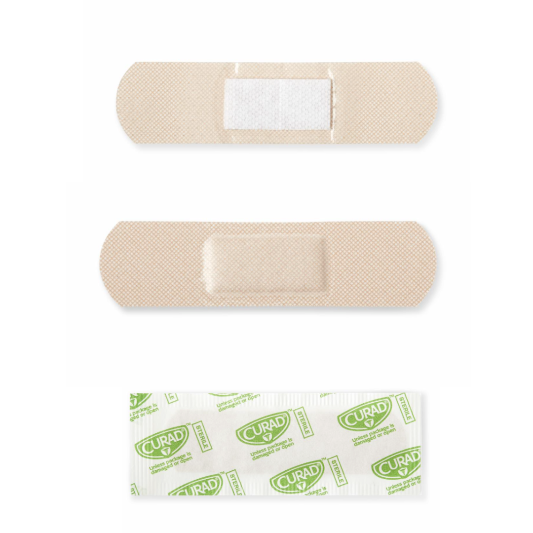 Two beige Medline CURAD Sheer Adhesive Bandages - Variety are shown, one face up and one down to display both sides. Below them is an unopened bandage in white and green CURAD packaging. Assorted sizes offer versatile coverage.