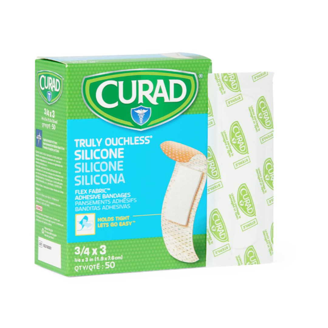 A green box of Medline CURAD Silicone Fabric Adhesive Bandages - 3/4" x 3" is shown with one bandage and its wrapper beside it. The box contains 50 fabric bandages—see the spec table for more details.