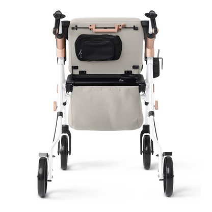Rear view of the Medline Empower Rollator with Microban, showcasing a beige seat and black wheels. This mobility aid features a light aluminum frame in a light color, along with black handlebars and a small black pouch at the back.