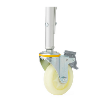 A Medline Aluminum Bariatric Commode wheel features a beige rubber wheel on a sturdy silver metal bracket and vertical rod, adorned with a yellow ring and gray brake lever for secure positioning.