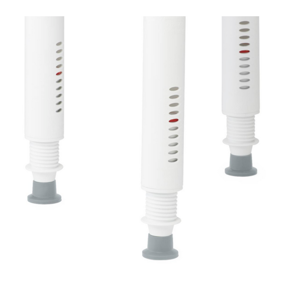 Close-up of three white, cylindrical legs with gray slip-resistant feet from the Medline Premium Plastic Shower Chair with Backrest. Oval openings show colored markers inside, set against a white background, ideal for a minimalist shower setup.