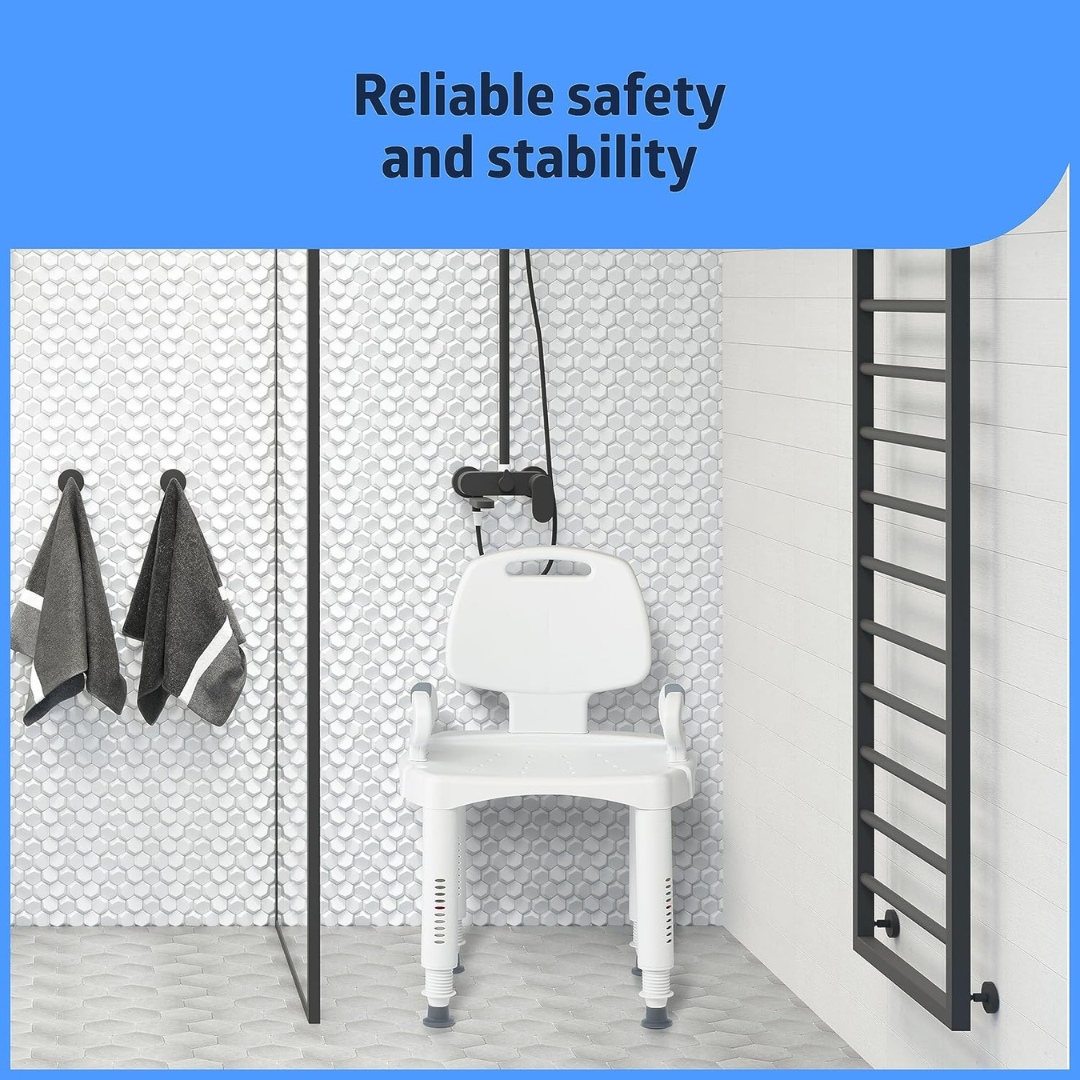 A bathroom has a Medline Premium Plastic Shower Chair with adjustable height under a black showerhead. Towels hang on hooks to the left, while a black ladder-style towel rack adorns the right wall. The text above states, Reliable safety and stability.