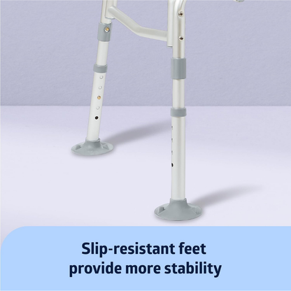 Close-up of the Medline Bariatric Padded Bathtub Transfer Bench legs featuring wide, gray slip-resistant tips on a light purple surface. Text reads: Slip-resistant feet provide more stability.