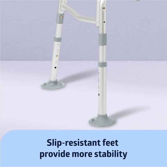 Close-up of the Medline Bariatric Padded Bathtub Transfer Bench legs featuring wide, gray slip-resistant tips on a light purple surface. Text reads: Slip-resistant feet provide more stability.