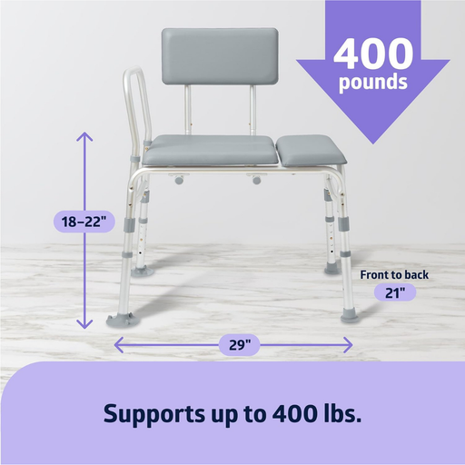 The Medline Bariatric Padded Bathtub Transfer Bench in gray, with backrest and arm support, rests on a marble floor. It features adjustable height (18–22”), measures 29” wide by 21” deep, and supports up to 400 lbs.