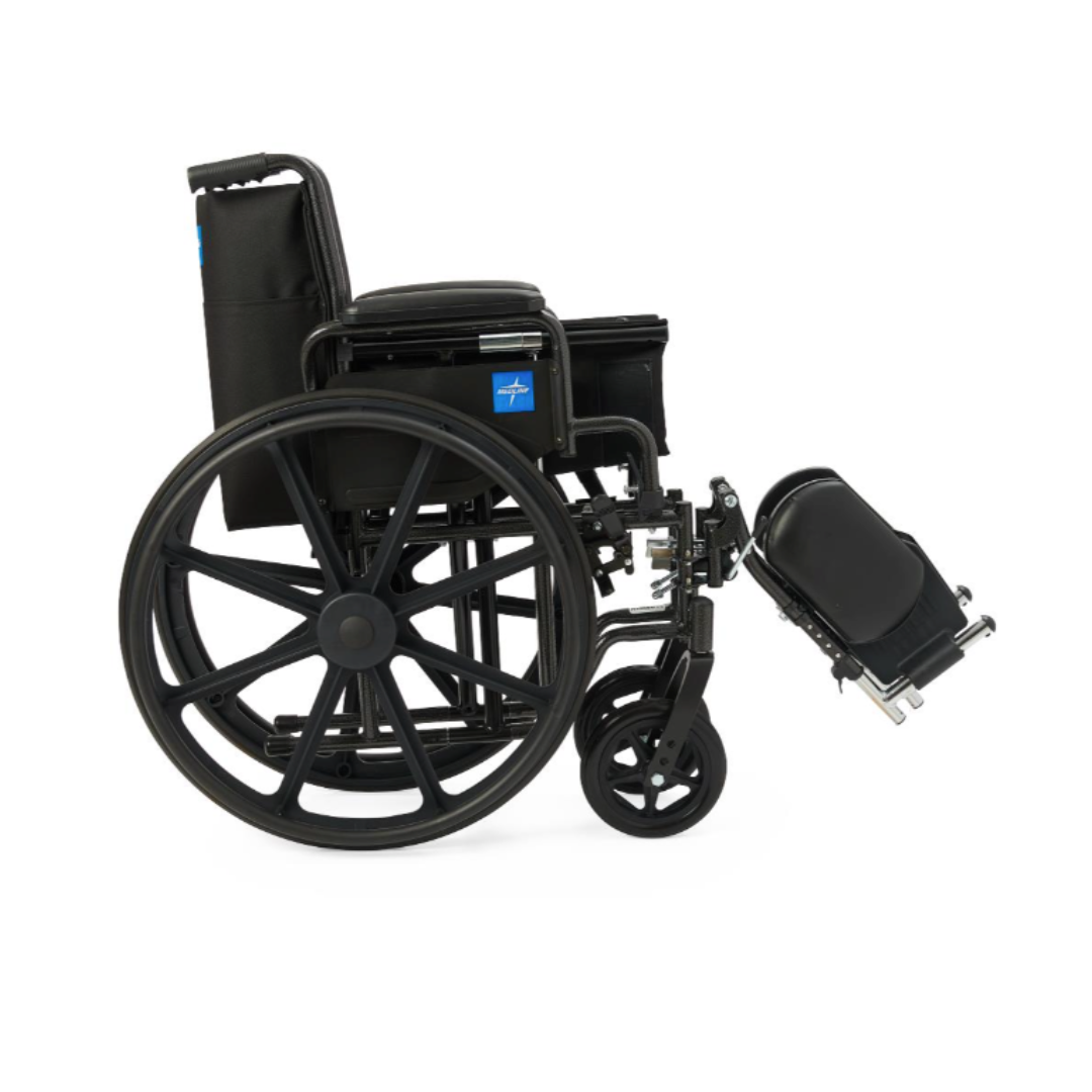 The Medline Guardian K1 Wheelchair with nylon upholstery is a durable black manual wheelchair featuring large rear wheels and a raised, detachable leg rest, shown in profile against a white background.