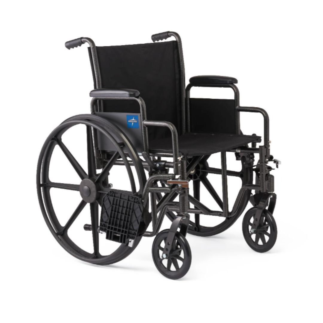 The Medline Guardian K1 Wheelchair features durable black nylon upholstery, large rear wheels, small front wheels, footrests, and armrests. Designed for daily use, it is shown on a white background.