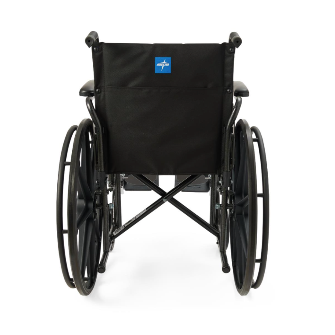 The Medline Guardian K1 Wheelchair with durable black nylon upholstery is ideal for everyday use, shown from the back with large rear wheels, handles, and a fabric backrest featuring a blue and white logo near the top center.