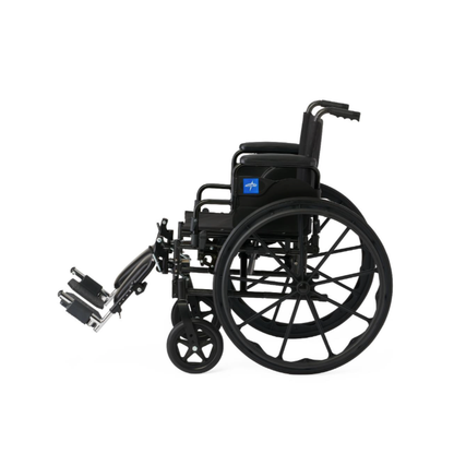A side view of the Medline Guardian K4 Wheelchair with Desk-Length Arms, featuring large rear wheels, small front wheels, padded armrests, and extended footrests, is displayed against a plain white background.