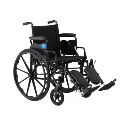 A Medline Guardian K4 Wheelchair with desk-length arms in black, featuring large rear wheels, small front wheels, and elevated leg rests, designed for lightweight portable mobility assistance.
