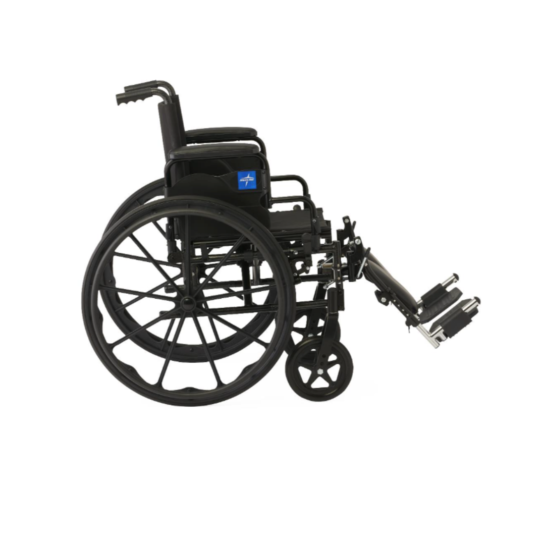 A black Medline Guardian K4 Wheelchair with desk-length arms, large rear wheels, and elevated footrests is shown from the side on a white background.