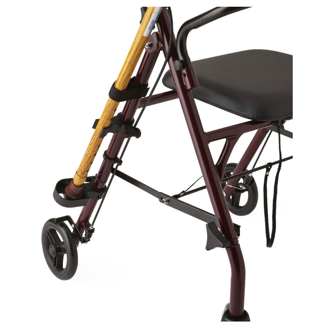 Close-up of a Medline Cup and Cane Holder Combo Pack for Walker/Rollators, featuring a burgundy walker with two wheels, an attached cushioned seat for comfort, and a metal frame for stability. A wooden cane is secured with black straps alongside the convenient drink holder.