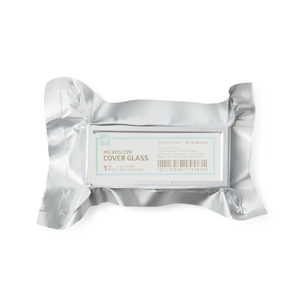 A sealed silver foil package holds a box labeled "Medline Microscope Slide Cover Glasses," displaying the product name, barcode, and details on the front.