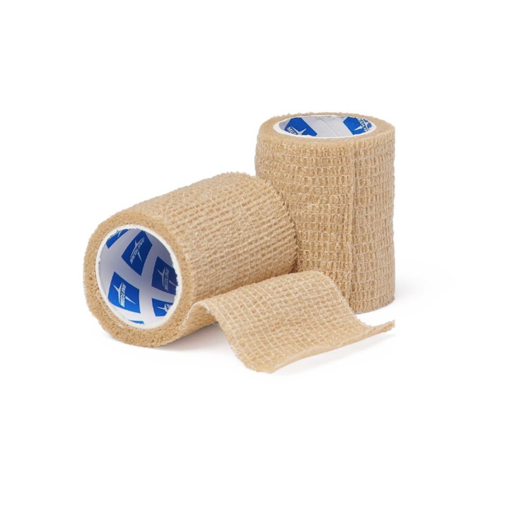 Two beige Medline Non-Sterile Tam Self-Adherent Wrap Short Rolls are shown on a white background, with one roll upright and the other lying down partially unrolled.