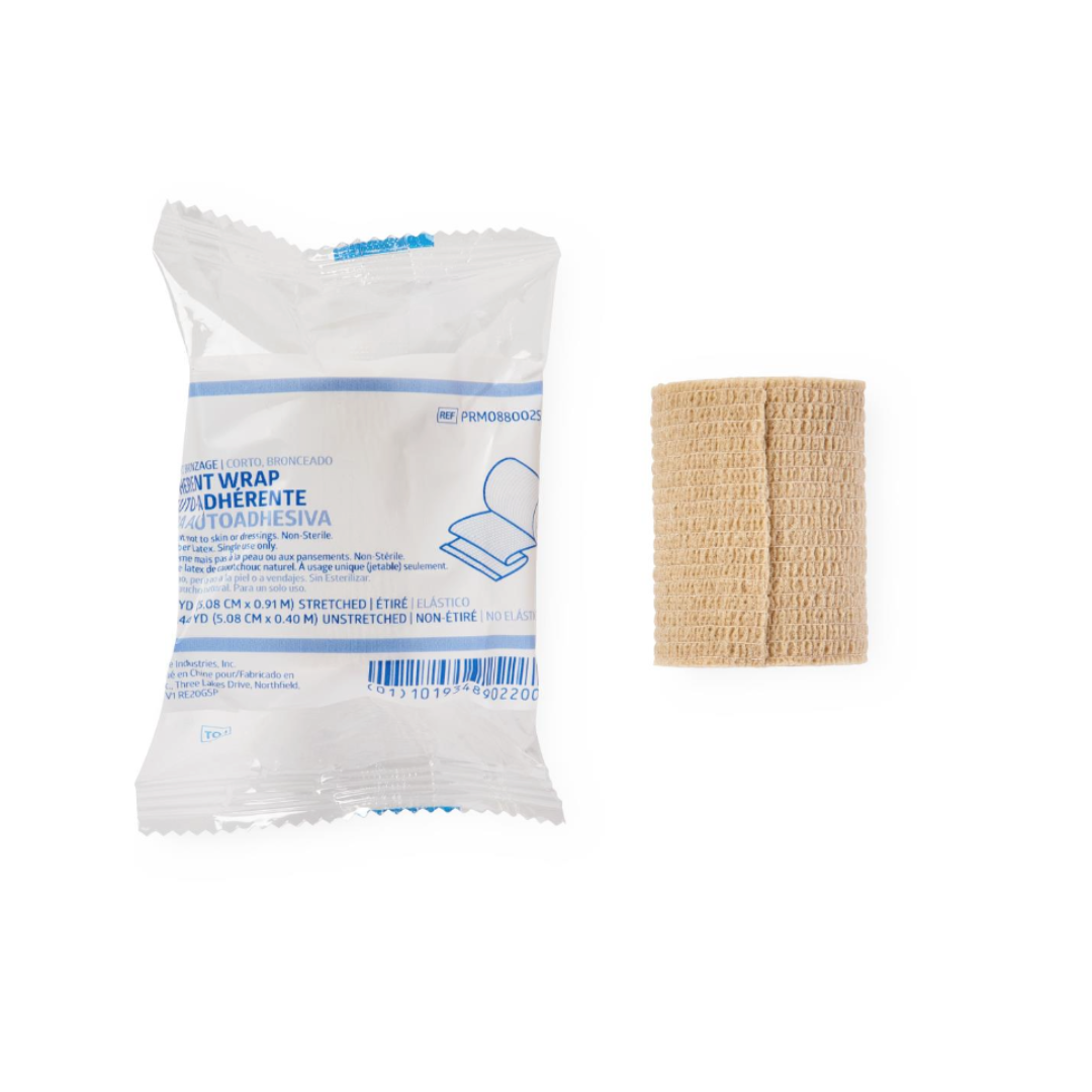 A packaged Medline Non-Sterile Tam Self-Adherent Wrap Short Roll is shown beside an unwrapped roll of the same beige wrap, both displayed on a white background.
