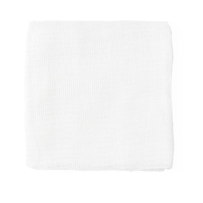 The image displays Medline Nonsterile 100% Cotton Woven Gauze Sponges—folded, white gauze cloths with a soft, textured surface—set against a plain white background.