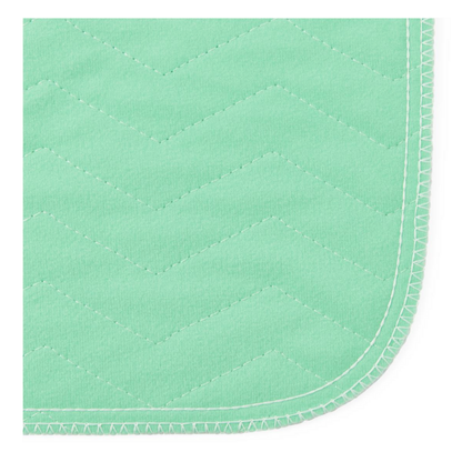 Close-up of Medline Quick Dry Poly Laminated Reusable Underpads (34 x 36) featuring light green quilted fabric, zigzag stitching, rounded edges, and a breathable polyurethane film for added comfort.