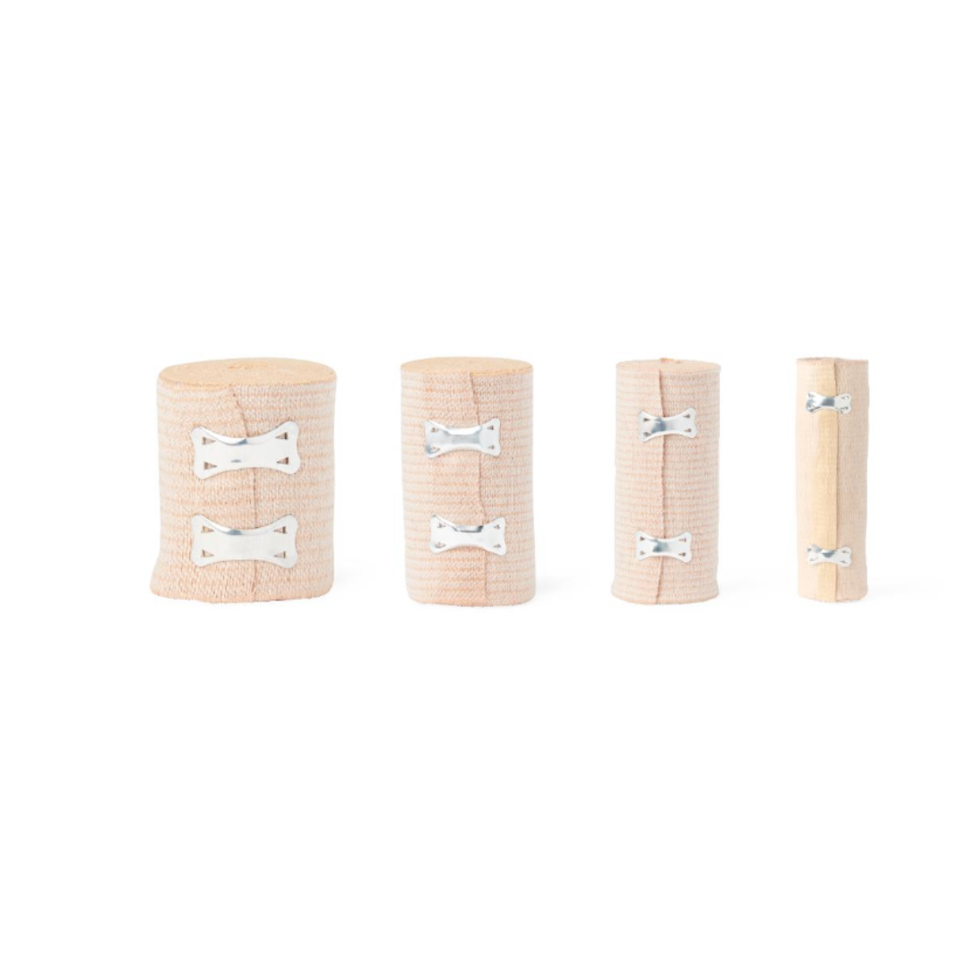 Four Medline Soft-Wrap Elastic Bandages, each with metal clips and in different widths, are lined up on a white background—versatile elastic bandages for compression and support.