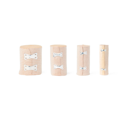 Four Medline Soft-Wrap Elastic Bandages, each with metal clips and in different widths, are lined up on a white background—versatile elastic bandages for compression and support.