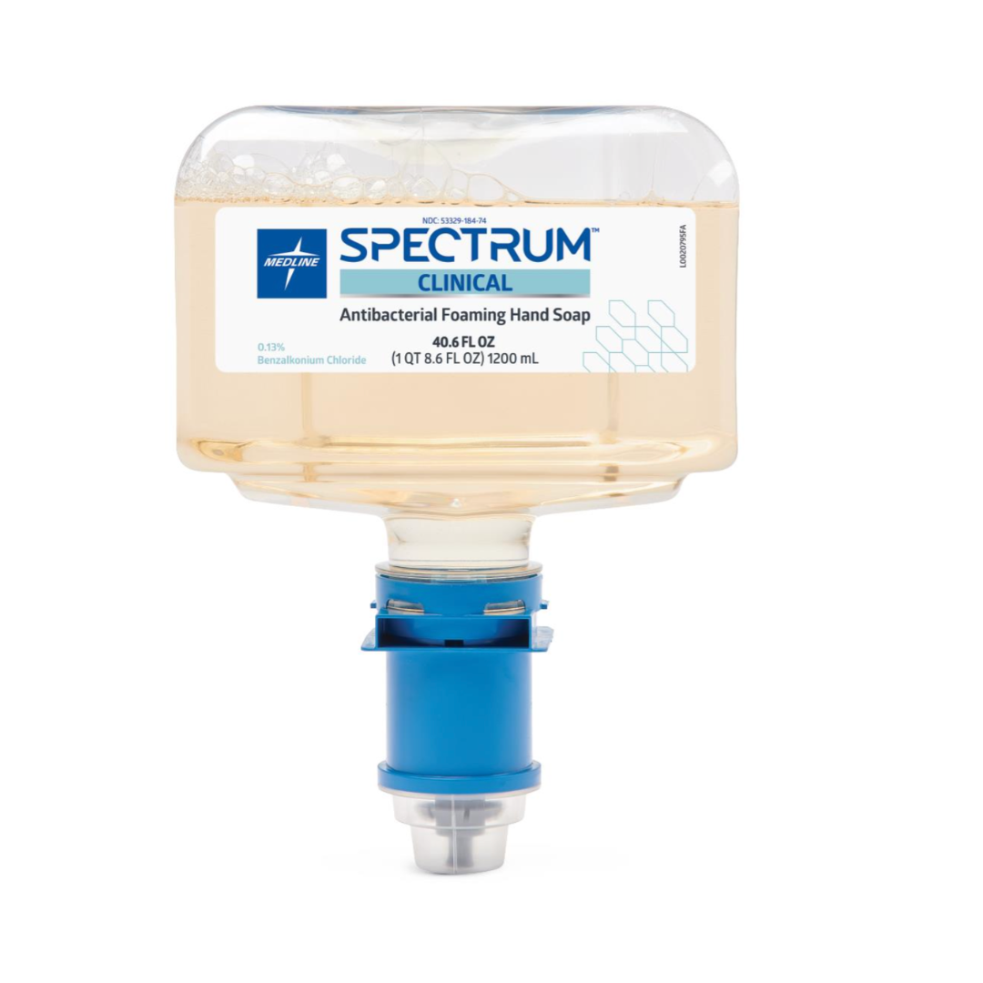 A 1.2L container of Medline Spectrum Antibacterial Foaming Hand Soap with a blue dispenser cap and clear soap inside; the label displays germ protection, product information, and ingredients.