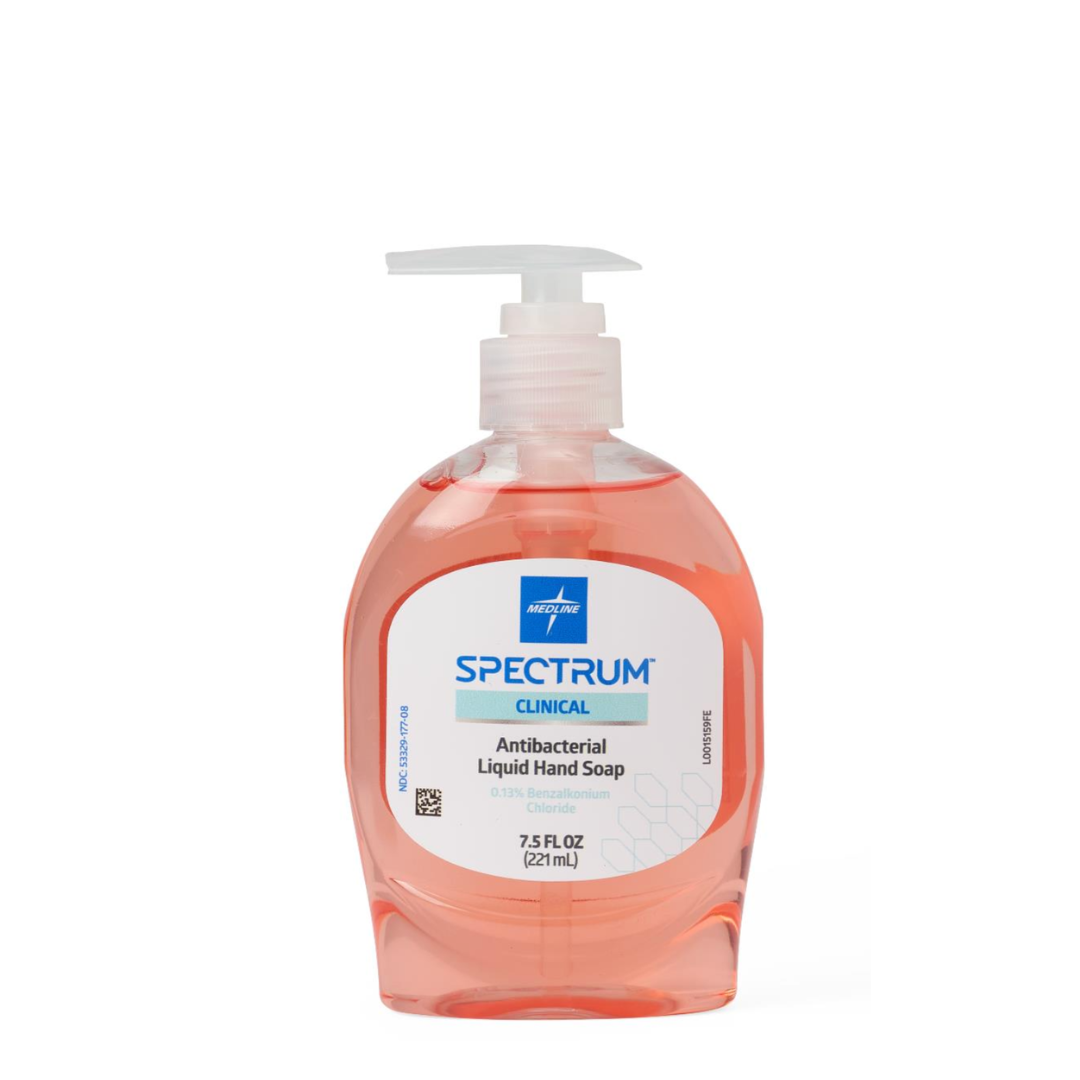 A clear plastic pump bottle of Medline Spectrum Antibacterial Liquid Hand Soap, with pink liquid and a 7.5 fl oz (221 mL) label, is displayed against a white background.