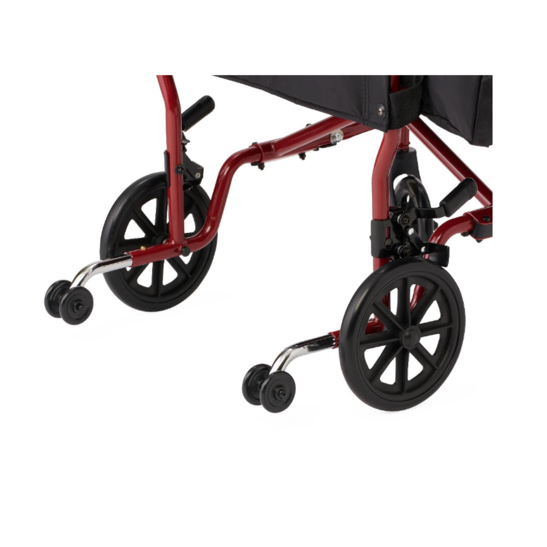 Close-up of the Medline Steel Transport Chair with Wide 19" Seat, highlighting the rear wheels, anti-tip wheels, and part of the seat and frame on this reliable mobility wheelchair.