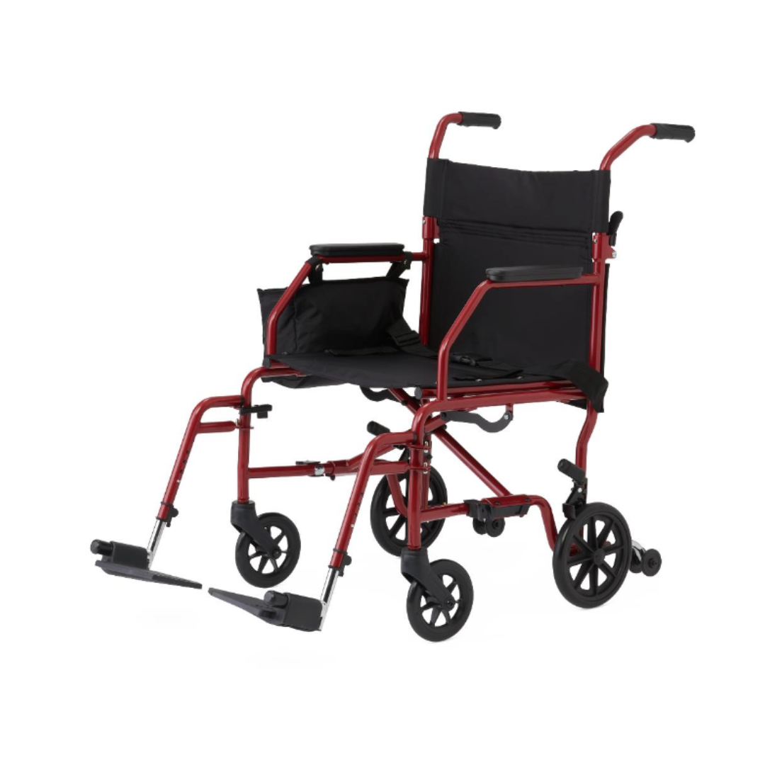 A lightweight Medline Steel Transport Chair with a wide 19" seat in red, featuring black seat/backrest, armrests, footrests, and four small wheels for easy mobility and portability.