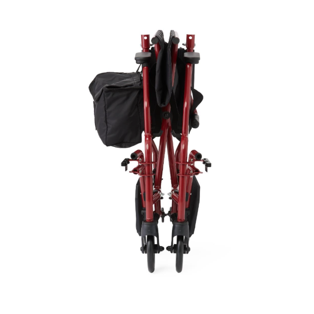 The Medline Steel Transport Chair with Wide 19" Seat is a red, foldable mobility aid featuring black wheels and a storage bag, shown compact and folded from the front—perfect for those needing a lightweight transport chair.