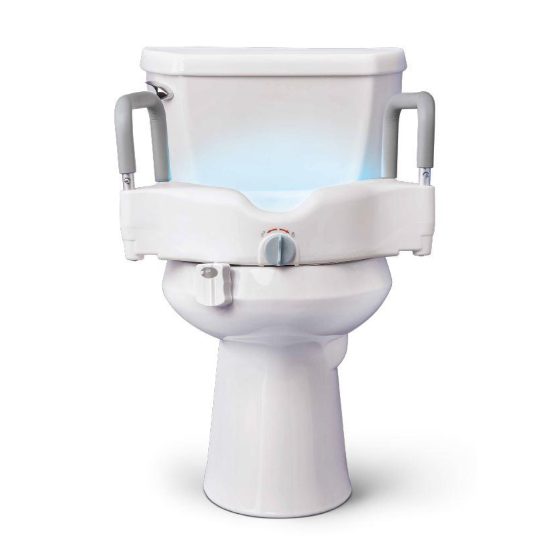 The Medline Toileting Safe and Easy Kit for Caregivers with Seat Riser features a white toilet, grey support handles, and a raised seat attachment, providing accessible bathroom safety and essential assistance.