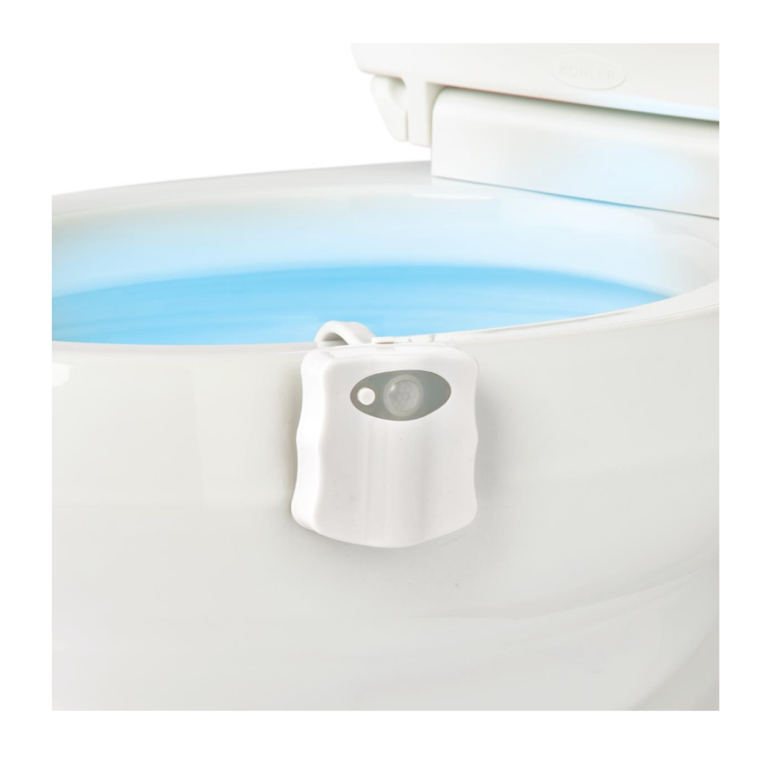 The Medline Toileting Safe and Easy Kit for Caregivers with Seat Riser enhances bathroom safety by illuminating the toilet bowl with a soft blue light, making nighttime visits safer and more convenient.