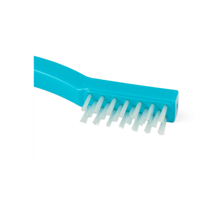 A close-up of a Medline Nylon Toothbrush Instrument Cleaning Brush with white bristles, set against a plain white background.
