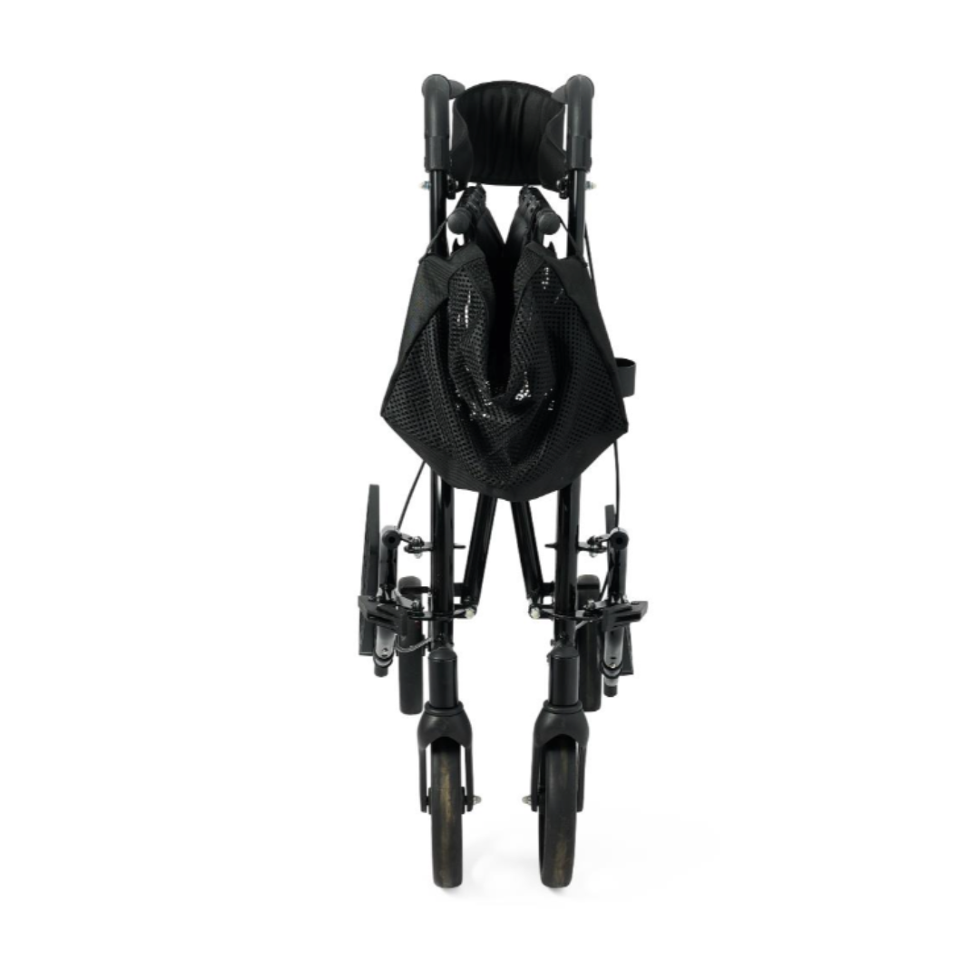 A black Medline Euro Translator Hybrid Transport Chair and Rollator, fully collapsed and shown from the front, with a carry bag attached for lightweight, convenient 2-in-1 mobility.