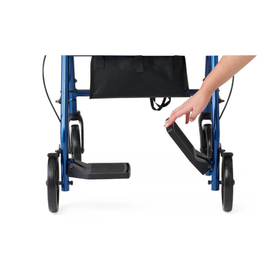 A person’s hand adjusts the footrest of a blue Medline Translator Hybrid Transport Chair and Rollator, a 2-in-1 mobility aid, seen from the front against a white background.