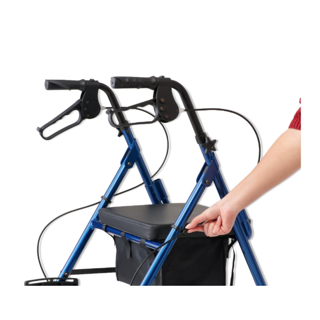 A hand pulls the strap on a blue Medline Translator Hybrid Transport Chair and Rollator with black handles, padded seat, and an underseat storage bag—an ideal 2-in-1 mobility solution.
