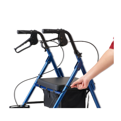 A hand pulls the strap on a blue Medline Translator Hybrid Transport Chair and Rollator with black handles, padded seat, and an underseat storage bag—an ideal 2-in-1 mobility solution.