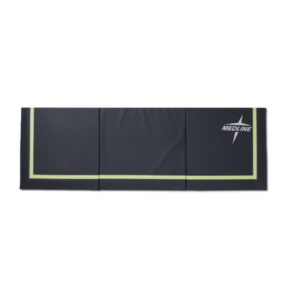 A folded, dark blue Medline Trifold Beveled Edge Fall Mat with Glow features a light green border, white Medline logo on the top right, and three vinyl segments for easy storage.