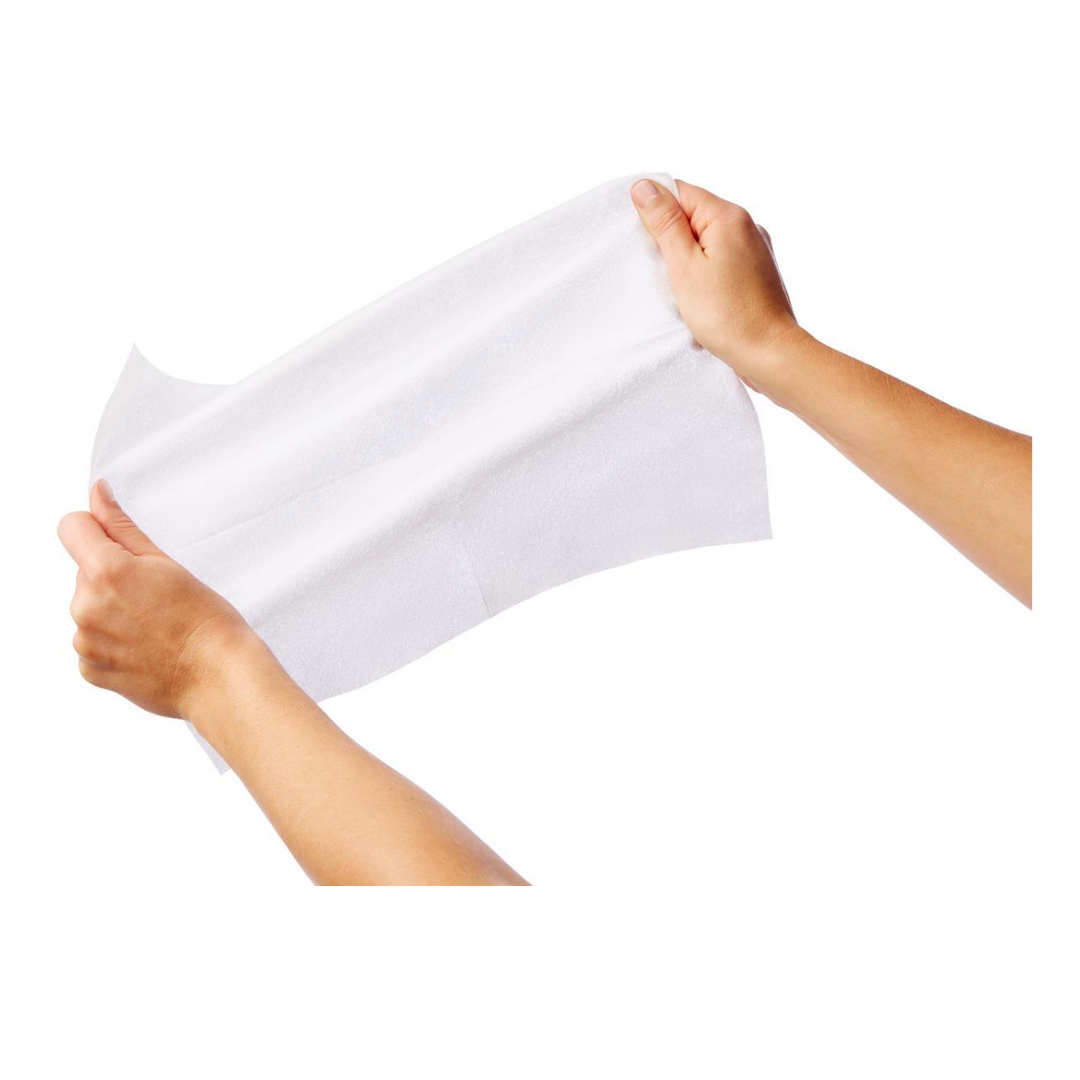 Two hands hold and gently stretch a large Medline Ultrasoft Disposable Dry Cleansing Cloth against a plain white background, ideal for incontinence care or as sensitive skin wipes.