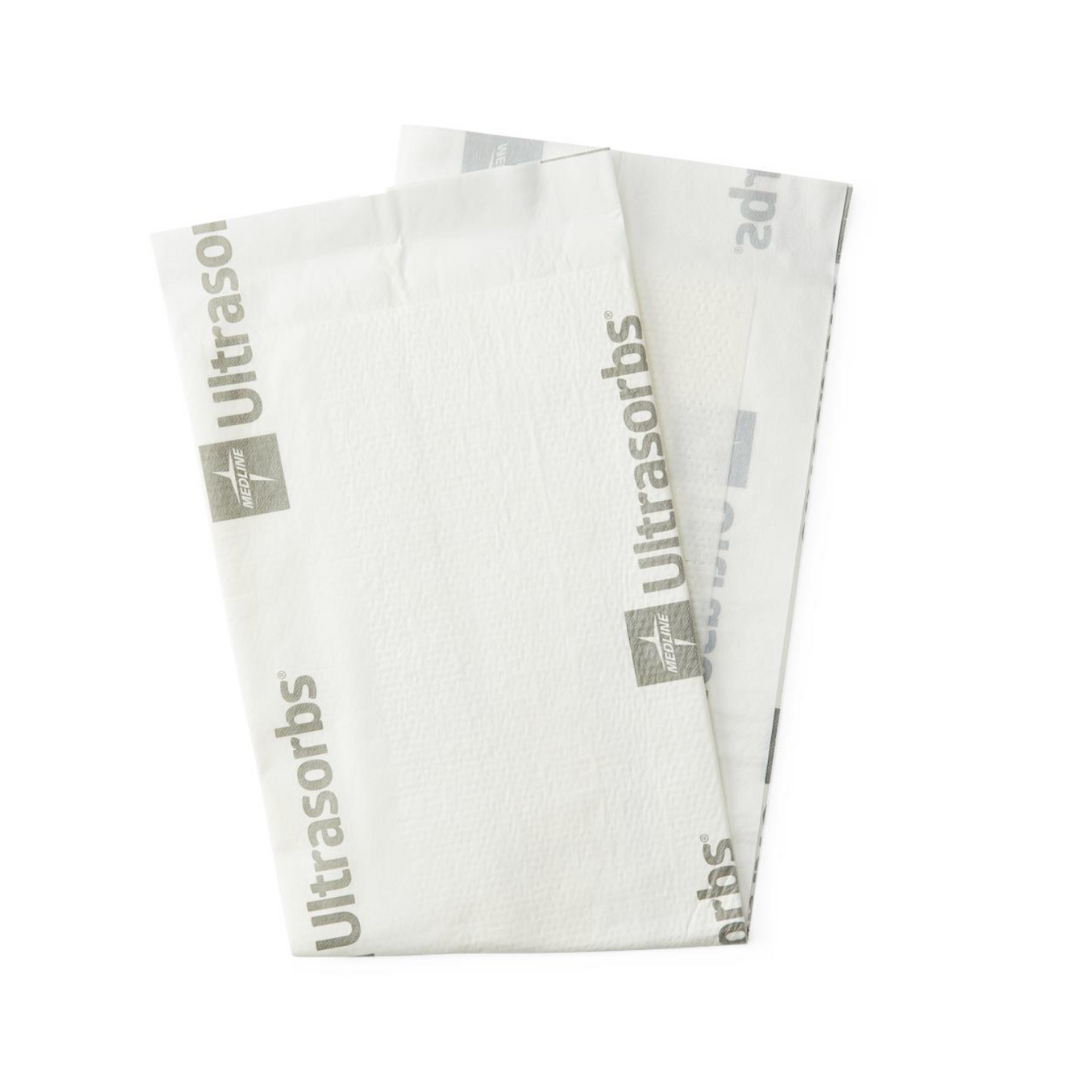 Two white rectangular Medline Ultrasorbs Premium Superabsorbent Underpads, air-permeable and overlapping slightly, feature gray "Ultrasorbs" text and a logo on a plain white background.
