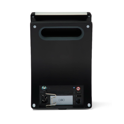 The image shows the back view of a Medline Vital Signs Monitor with Blood Pressure and SpO2, featuring a handle, power socket, ports, and a paper roll compartment at the top.