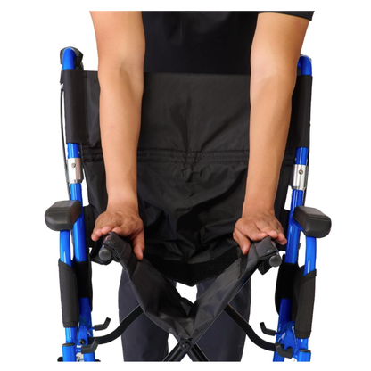 A person is folding a Medline Zero G Ultralite Transport Chair, highlighting its lightweight, foldable design and partially collapsed aluminum frame.