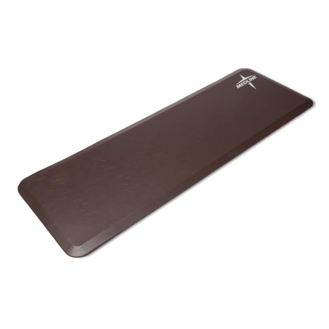 A dark brown, rectangular Medline Beveled Edge Bedside Fall Mat with rounded corners and a white MEDline logo on one end is shown on a white background—ideal for your product description or spec table.
