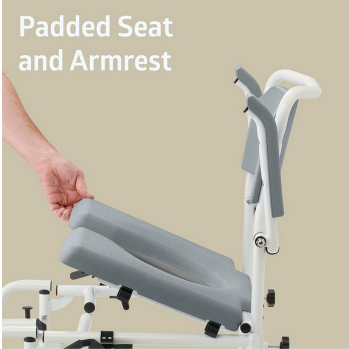 A hand pulls the padded seat from a white frame with padded armrests. Against a beige background, 3-in-1 Design showcases the Medline Aluminum Padded Shower Chair Commodes versatility as a shower wheelchair commode.