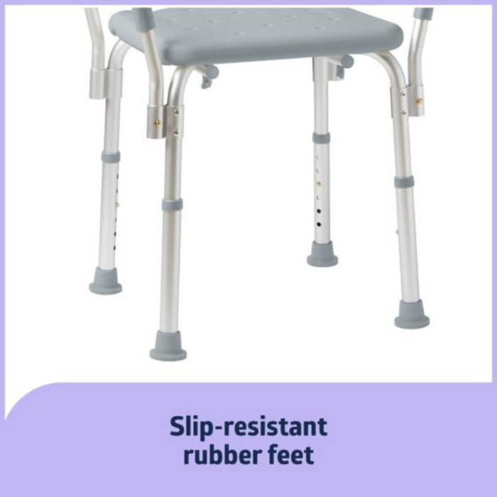 Close-up of the Medline Knockdown Portable Shower Chair shows a gray, height-adjustable seat with six metal legs, each ending in slip-resistant rubber feet. Text reads Slip-resistant rubber feet on a purple background.