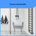 In a modern bathroom, a textured white wall features a walk-in shower and the Medline Knockdown Portable Shower Chair with Padded Armrests. Two dark towels hang on the left, and a sleek black vertical towel rack is on the right. Text above reads Secure and durable.